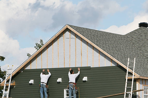 Professional Siding technician working in Freeland, MD
